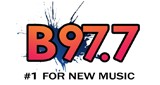 B97.7